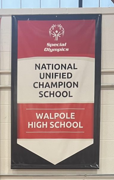 A banner is displayed in the WHS gym to recognize achievement from Special Olympics.